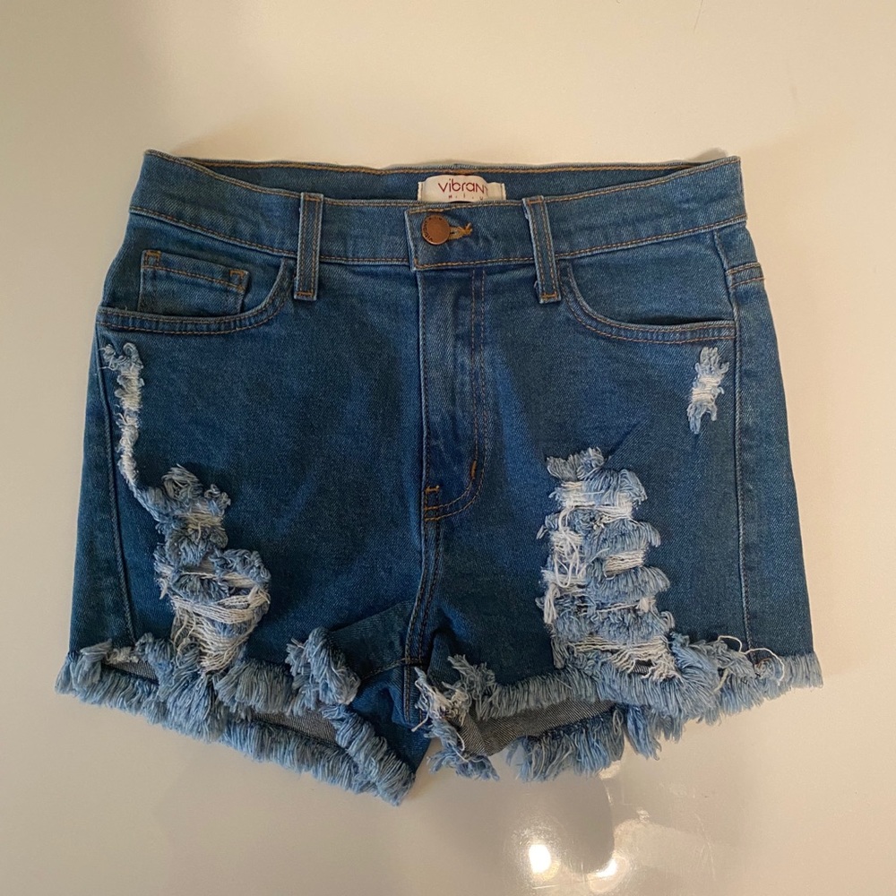 Distressed denim shorts